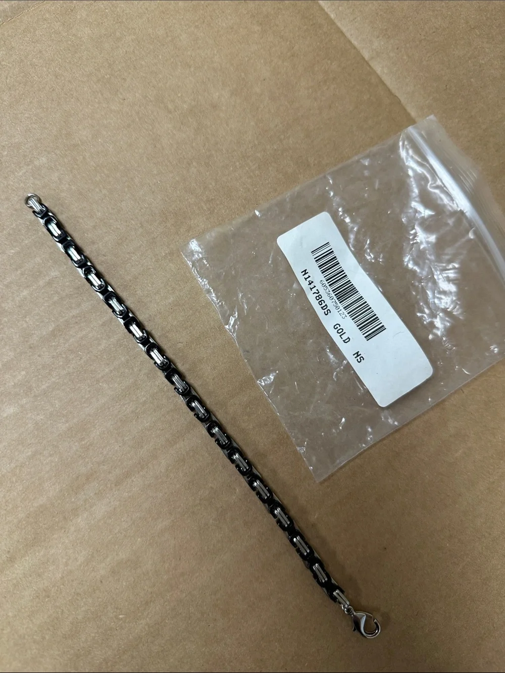 ##122, Guess/Marciano Two-Tone Black and Silver Chain Bracelet